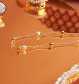Close-up of luxurious accessories on a marble table.
